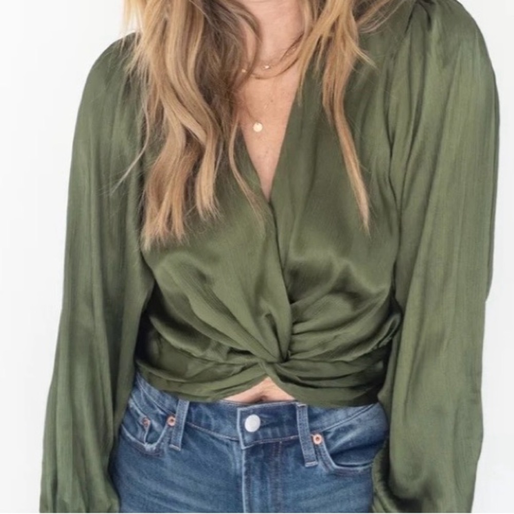 Olive blouse. Size small. Twist in front and hidden zipper for easy pull on.